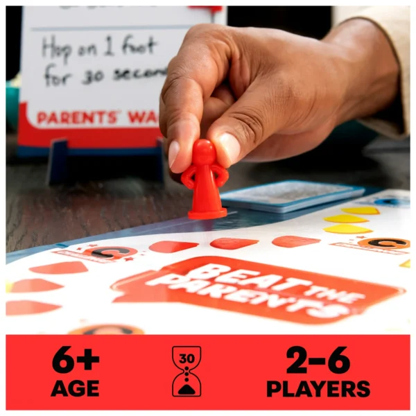 Image of a person playing Beat the Parents Classic Family Trivia Game